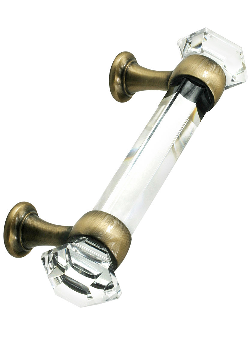 3 inch On Center Hexagonal Cut Glass Handle With Solid Brass Bases in Antique Brass.